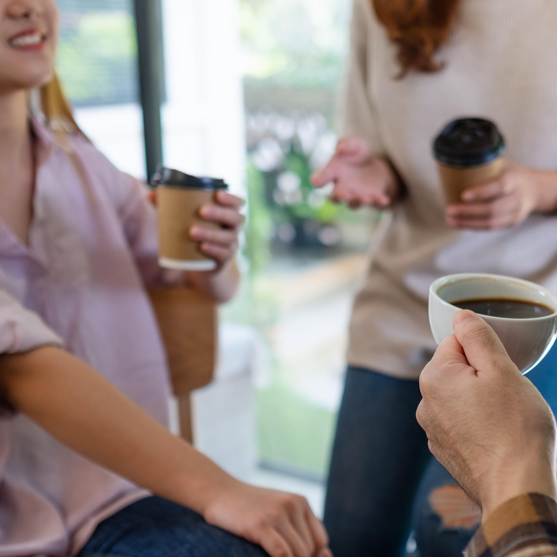 closeup-image-group-young-people-enjoyed-talking-drinking-coffee-together-3750x3750